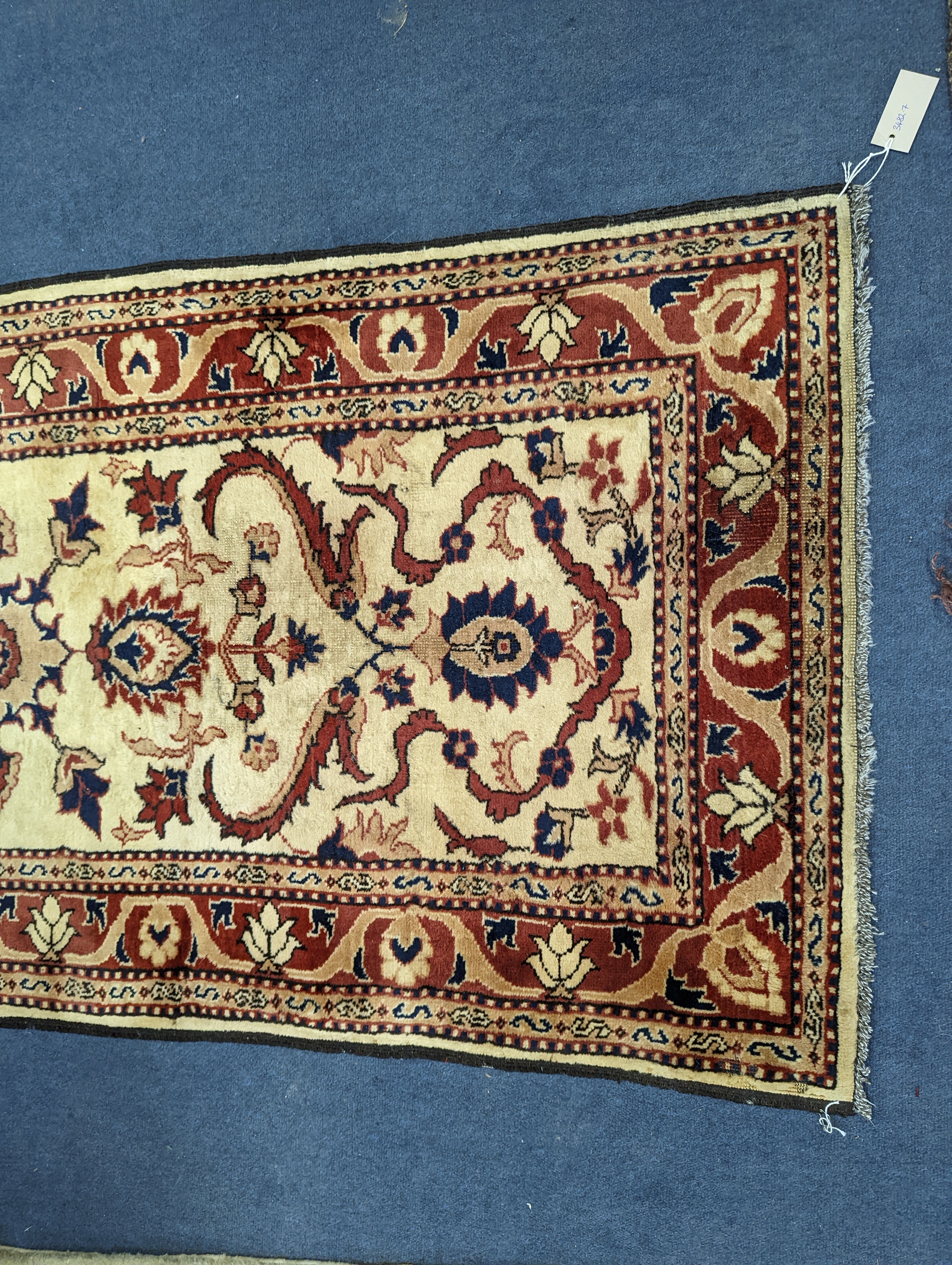 An Uzbek style rug, 320 x 84cm